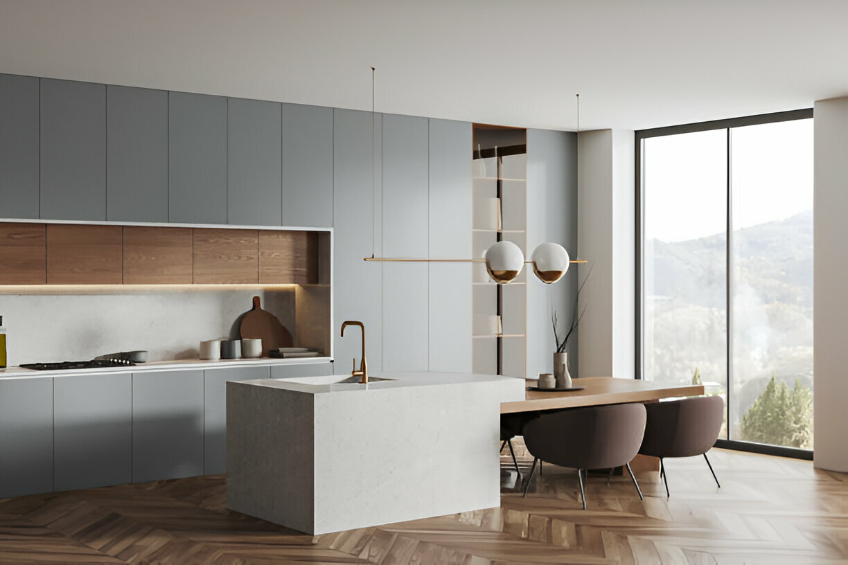 Minimalist kitchen with gray cabinets, wood accents, marble island, gold pendant lighting, and floor-to-ceiling windows with scenic views