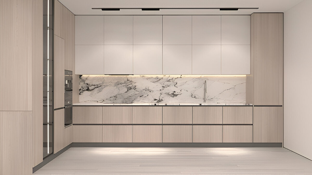 Minimalist modern kitchen with light wood cabinets, marble backsplash, and sleek built-in appliances.