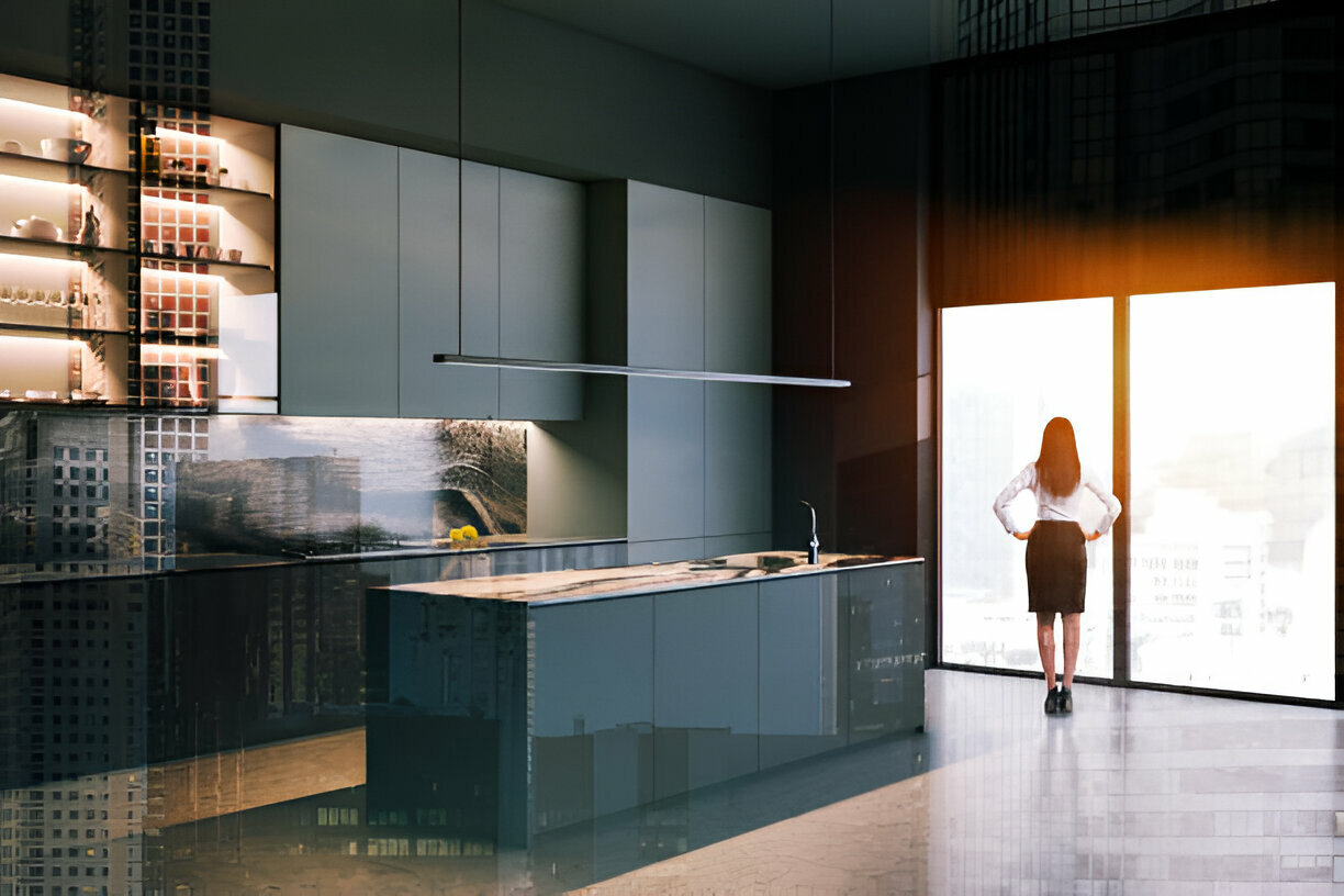 Modern high-rise kitchen with sleek black cabinets and city view